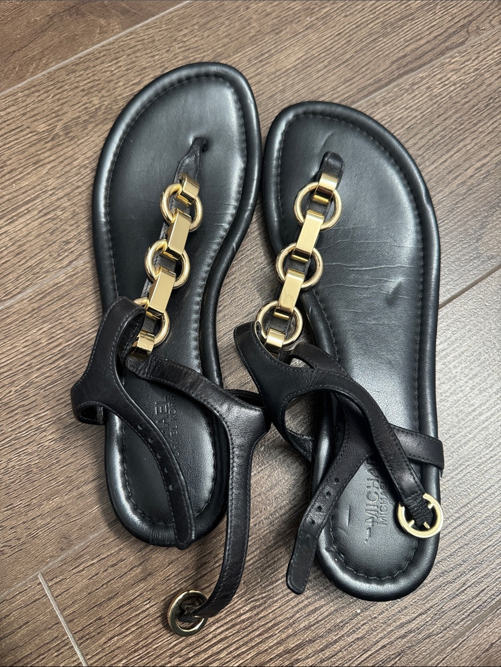 Michael Kors Black Leather T-Strap Sandals with Gold Chain Accent